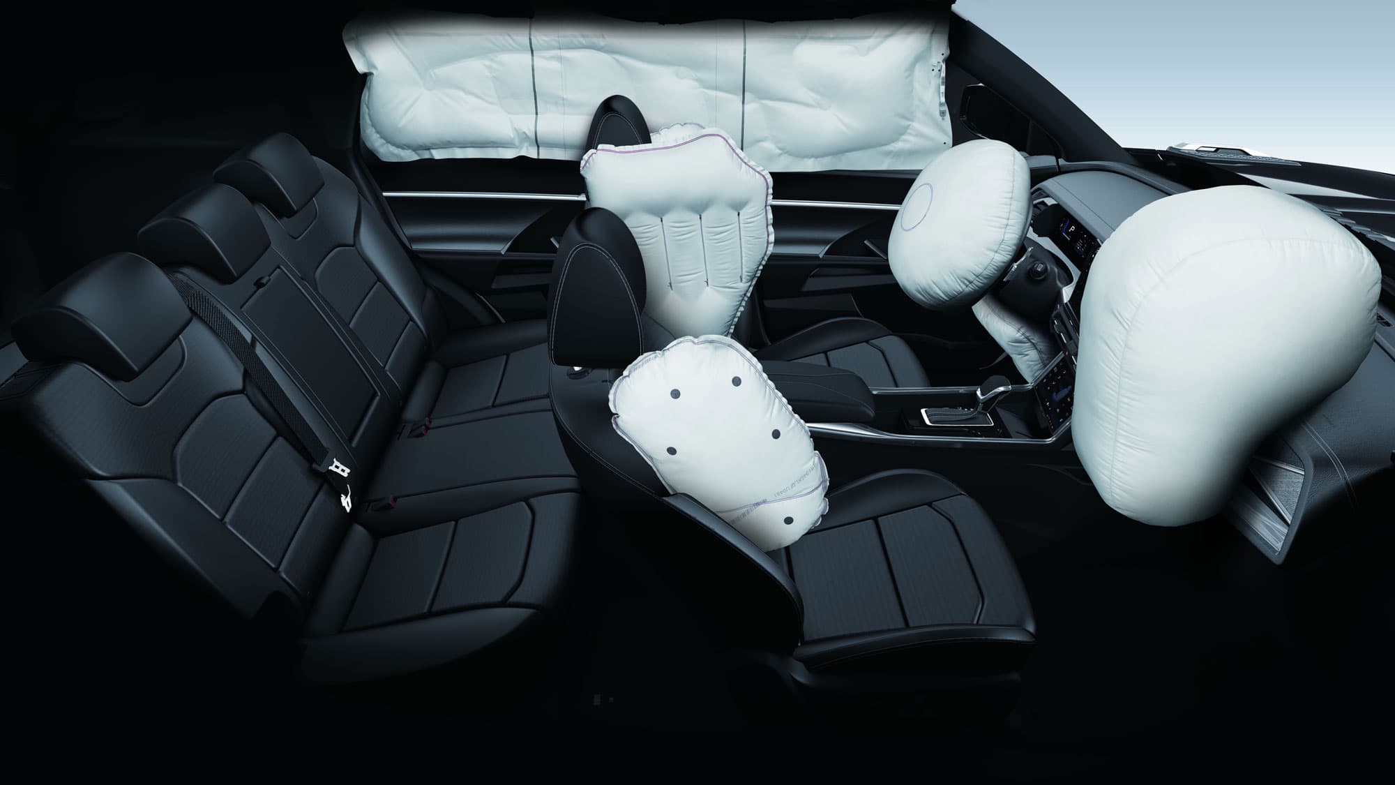 Foto van de airbags van de Torres met een zwart interieur.