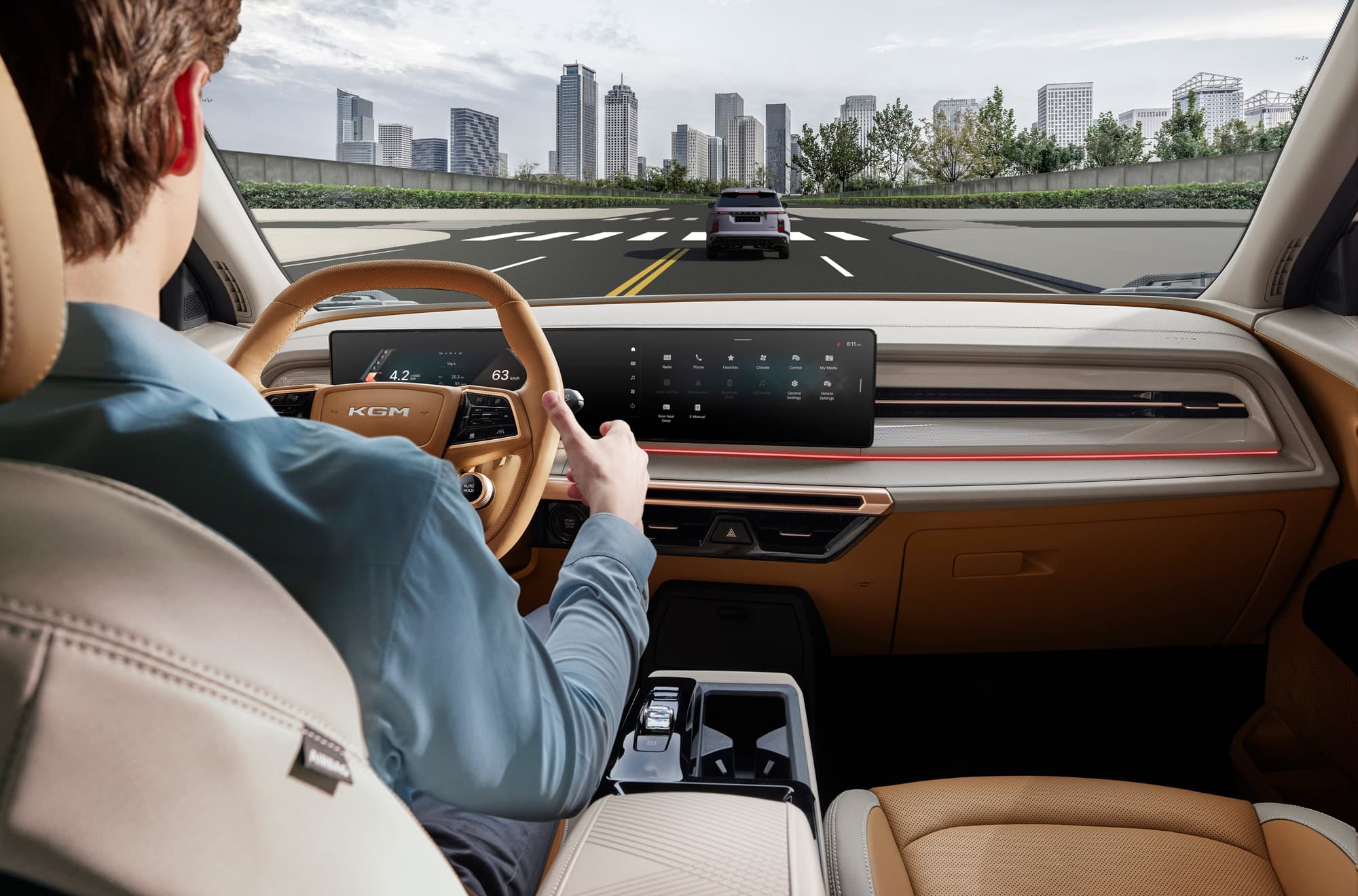 KGM Actyon man behind the steering wheel and dashboard