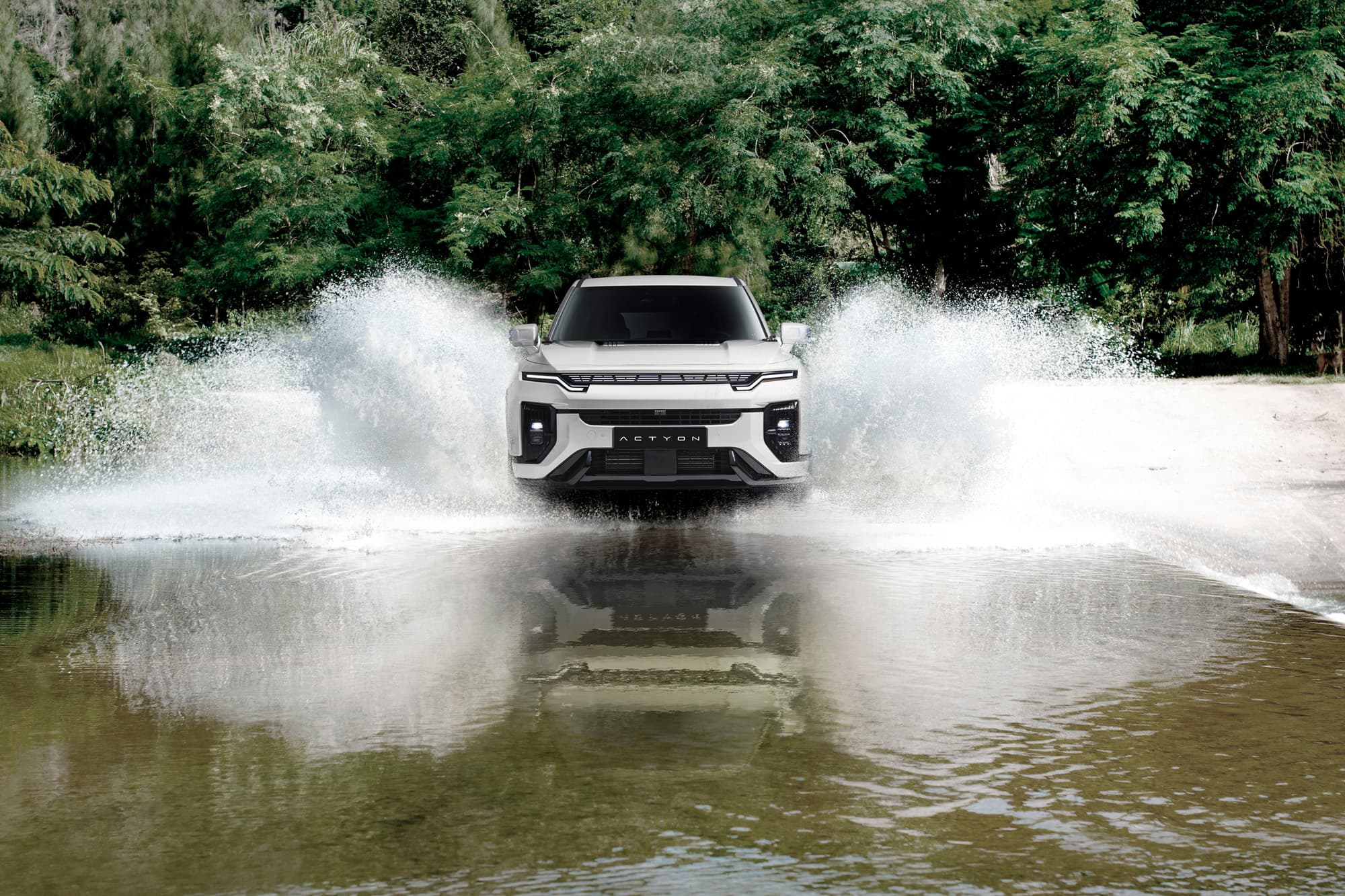 KGM Actyon driving through river front