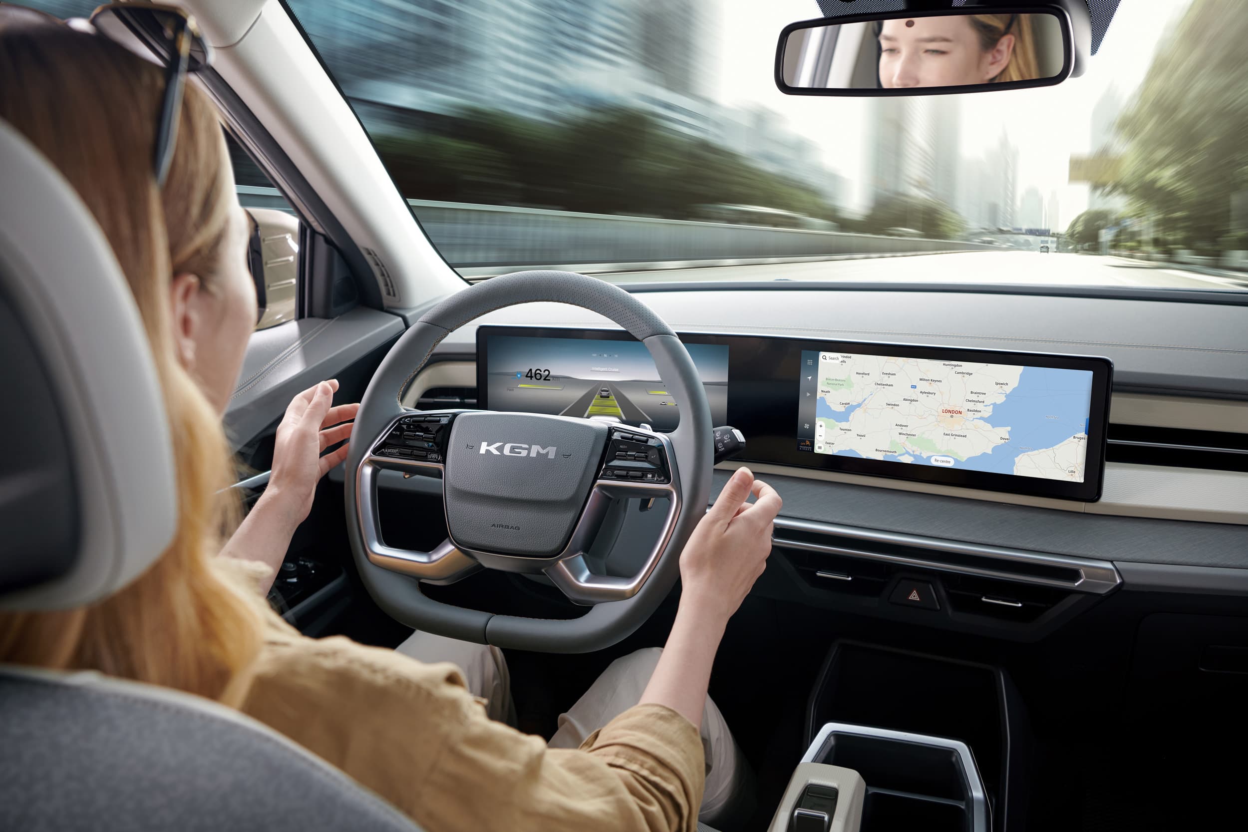 KGM Torres EVX woman driving